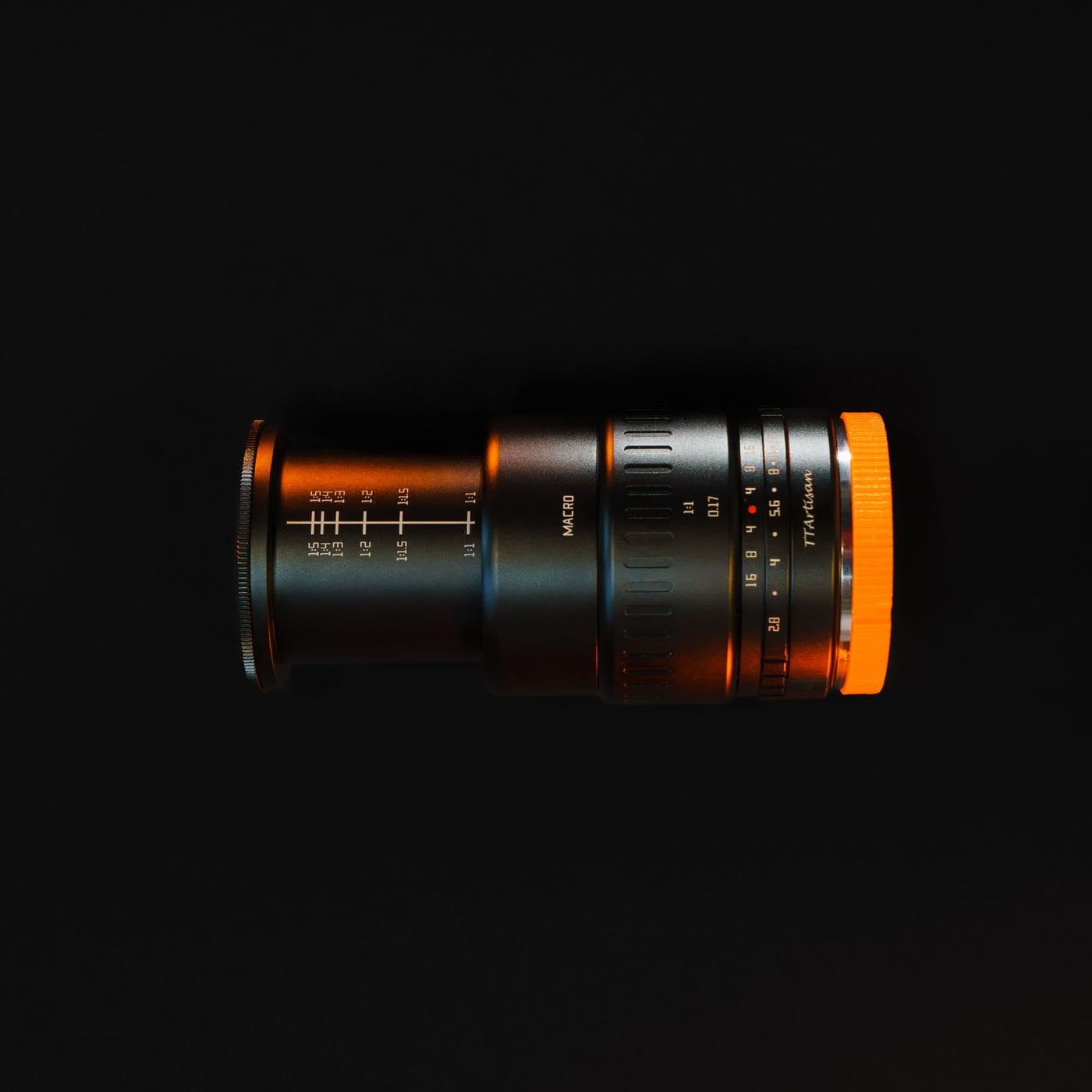 A cinematic macro shot of a professional camera lens showing the internal glass and aperture.